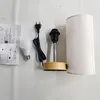 A disassembled bedside lamp with its components laid out on a white wall. Produktbild-Vorschau