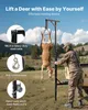 A hunter uses a game hoist to lift a deer next to a truck in a grassy, wooded area. Náhľad obrázku produktu