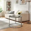 A living room scene with a couch, coffee table, and shelf. Produktbild-Vorschau