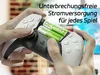 Hands holding a game controller with batteries inserted, with a blurred background of a screen displaying a game. Produktbild-Vorschau