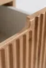 Close-up of a wooden cabinet with vertical fluting. Náhľad obrázku produktu