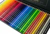A close-up view of a metal case filled with a variety of colored pencils. Voir les images du produit