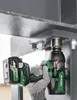 A gloved hand is holding a HiKOKI cordless impact wrench and using it to tighten a bolt on a metal structure. Voir les images du produit