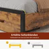 Close-up of a bed frame with a mattress and blanket, highlighting a feature with text and diagrams. Produktbild-Vorschau