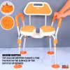 A shower chair with orange and white accents, featuring vacuum grippers for stability. The image includes close-ups of the grippers and a hand demonstrating the armrest. Podgląd zdjęcia produktu