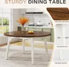 A round dining table with a brown top and white legs, set in a kitchen environment. Náhľad obrázku produktu