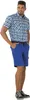 A man wearing a blue plaid shirt and blue shorts stands against a white background. Produktbild-Vorschau