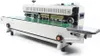 A studio shot of an automatic sealing machine. Náhled obrázku produktu