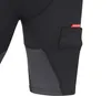 A close-up view of a black compression short with a small red CCM logo tag on a pocket. Náhled obrázku produktu