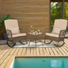 A patio set with two rocking chairs and a small table on a wooden deck next to a pool. Podgląd zdjęcia produktu