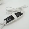 A close-up shot of a white electric blanket controller with a cord and plug. Produktbild-Vorschau