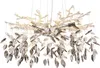 A chandelier with crystal-like elements hanging from a metallic frame. Anteprima dell’immagine prodotto