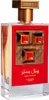A perfume bottle with a red label and gold accents. Voir les images du produit