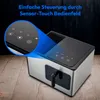 A close-up marketing image of a MEDION ice maker, highlighting its sensor-touch control panel with a blue overlay. Produktbild-Vorschau