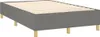 A dark gray box spring bed frame with wooden slats and legs, shown from a diagonal angle against a white background. Náhled obrázku produktu