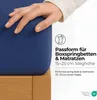 A hand is shown pressing down on a dark blue fitted sheet, which is draped over a wooden bed frame. Text overlays provide product information. Produktbild-Vorschau