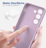 A hand is touching a purple phone case, highlighting its matte surface and soft grip. Produktbild-Vorschau