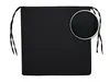 A black seat cushion with ties, shown flat against a white background. Produktbild-Vorschau