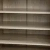 Close-up view of wooden shelves. Produktbild-Vorschau