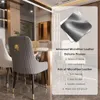 A dining room setting with chairs around a table, featuring a close-up of a chair's material and features. Produktbild-Vorschau