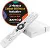 A white streaming device and remote control are shown, with a circular marketing graphic in the background. Produktbild-Vorschau
