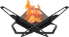 A black metal fire pit with burning wood and flames, presented on a white background. Produktbild-Vorschau