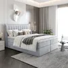 A modern bedroom with a large bed, bedside table, and curtains. Produktbild-Vorschau