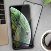 A screen protector is placed over an iPhone, with a laptop and a cup of coffee in the background. Anteprima dell’immagine prodotto
