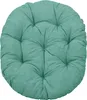A round, tufted cushion in a teal color. Produktbild-Vorschau