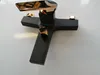 A close-up studio shot of a black and gold bathtub faucet. Produktbild-Vorschau