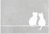 Two white cats are sitting on a gray surface, with a white line separating the surface from the background. Produktbild-Vorschau
