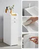 A collage of images showcasing a narrow white bathroom cabinet with drawers and a door. Náhled obrázku produktu