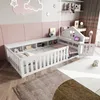 A child's bed with storage and a small desk area in a bedroom. Produktbild-Vorschau