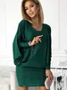 A woman wearing a green dress. Anteprima dell’immagine prodotto