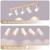 A split image showing a ceiling light fixture mounted on a ceiling and then mounted on a wall. Produktbild-Vorschau