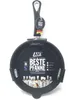 A frying pan with marketing material and chefs in chef hats printed on the inside. Náhled obrázku produktu