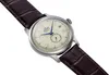 A close-up, angled shot of a men's wristwatch with a brown leather strap. Produktbild-Vorschau