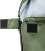 A close-up view of a green sleeping bag, showing the zipper and velcro closure. Náhľad obrázku produktu