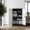 An open metal cabinet filled with office supplies and books, placed on a wooden floor in a well-lit room. Produktbild-Vorschau