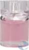 A close-up studio shot of a pink perfume bottle with a clear cap and silver accents. Podgląd zdjęcia produktu