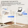 A white adjustable height table with a laptop on it, placed next to a white sofa. Voir les images du produit