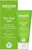 A product box and tube of Weleda Skin Food Light cream. Voir les images du produit