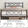 A metal bed frame with a mattress and bedding, shown with an informational overlay at the bottom. Podgląd zdjęcia produktu