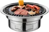 A round charcoal grill with food cooking on it. Náhled obrázku produktu