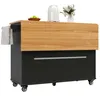 A kitchen cart with a drop-leaf countertop, a towel rack, and some decorative items on top. Podgląd zdjęcia produktu