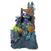 A diorama of an underwater scene from Avatar: The Way of Water, featuring two figures standing on a platform above coral and rock formations. Náhled obrázku produktu