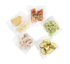 Various food items vacuum-sealed in plastic bags arranged in a circular pattern. Náhľad obrázku produktu