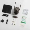 A collection of items for a 4G LTE surveillance camera kit, including the camera, solar panel, mounting hardware, cables, and documentation, laid out on a white surface. Produktbild-Vorschau