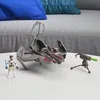 A Star Wars toy set including a spaceship, a figure, and a weapon, displayed on a white surface. Produktbild-Vorschau