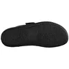 The image shows the sole of a black sandal. Anteprima dell’immagine prodotto